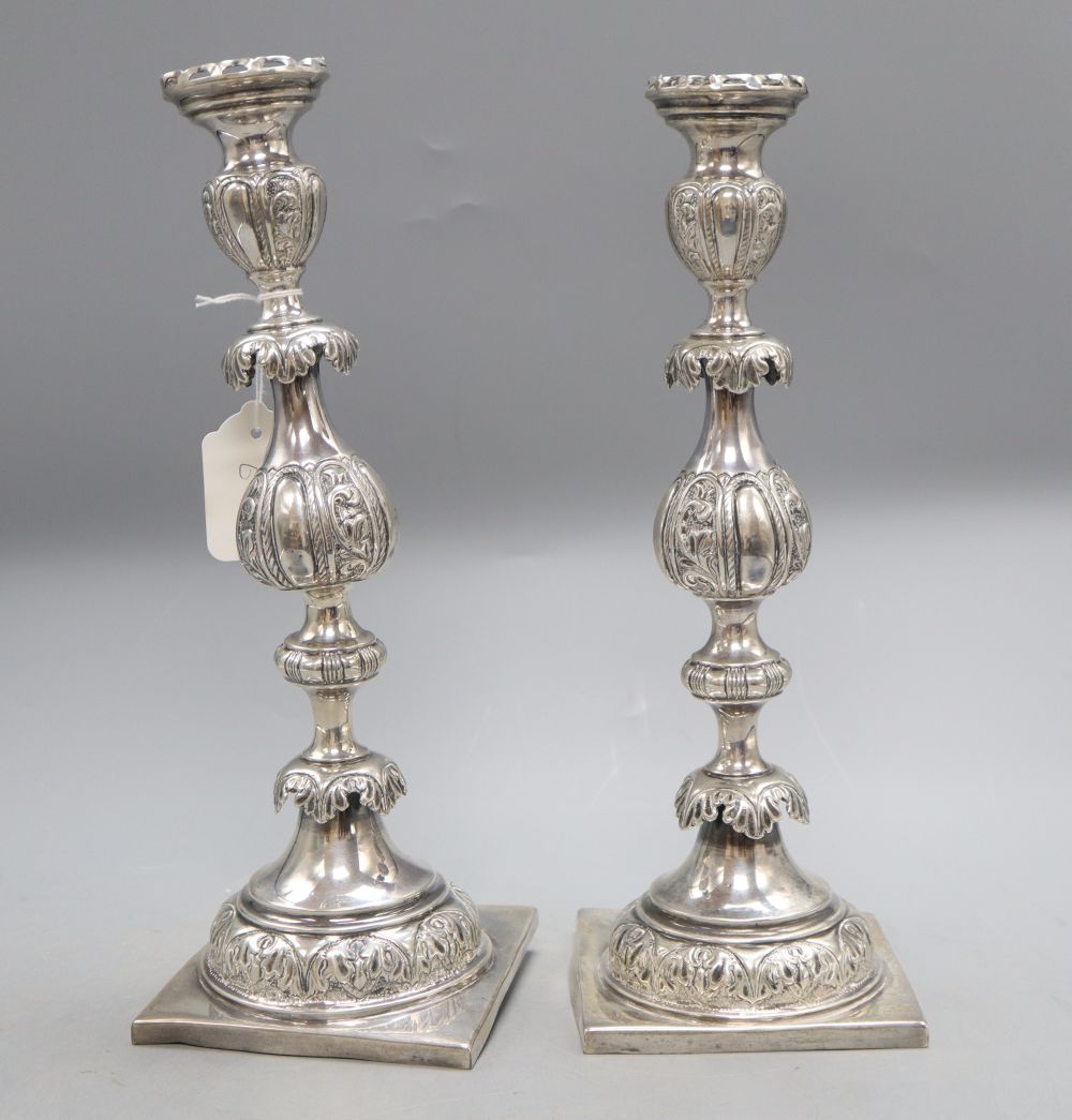 A pair of 19th century Russian 84 zolotnik Sabbath Day candlesticks, retailed by J. Goldman,